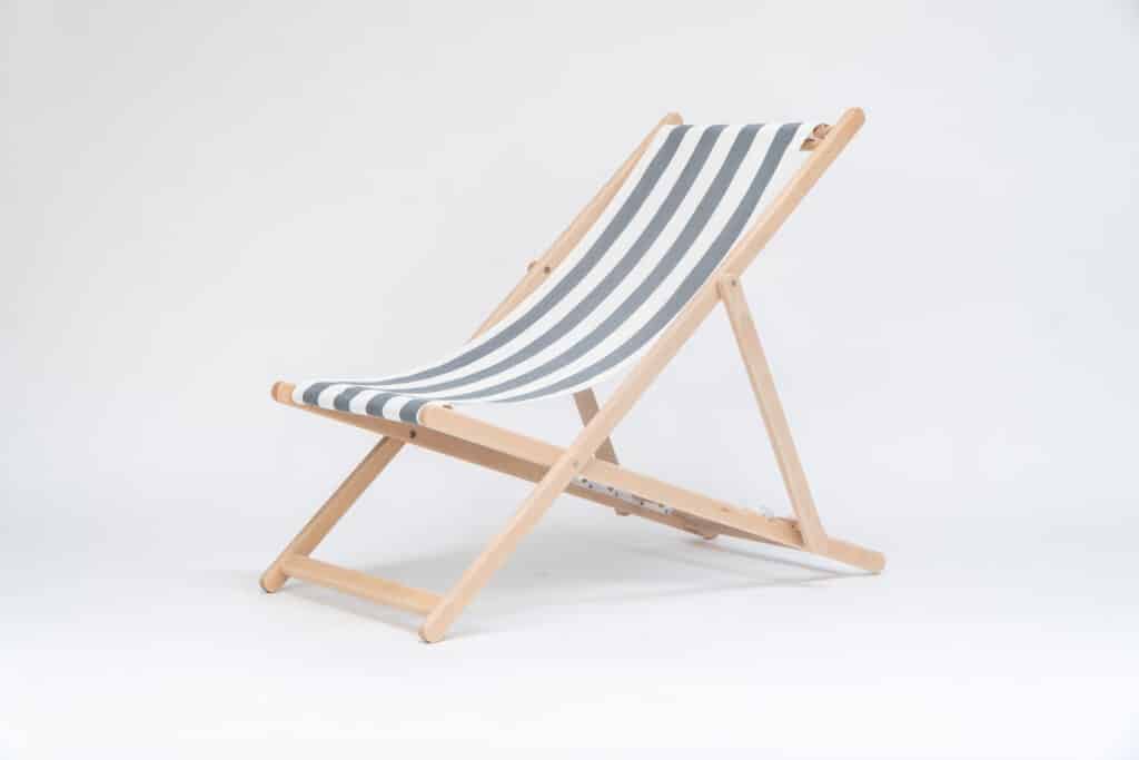 Beechwood Deckchair with Hurling fabric, charcoal and white stripes, viewed from an angle - created by Decks and Stipes Ireland