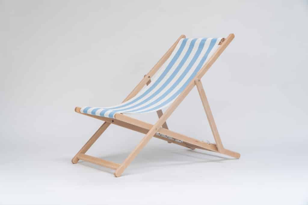 Beechwood Deckchair with Ice Dancing fabric, sky blue and white stripes, viewed from an angle - created by Decks and Stipes Ireland