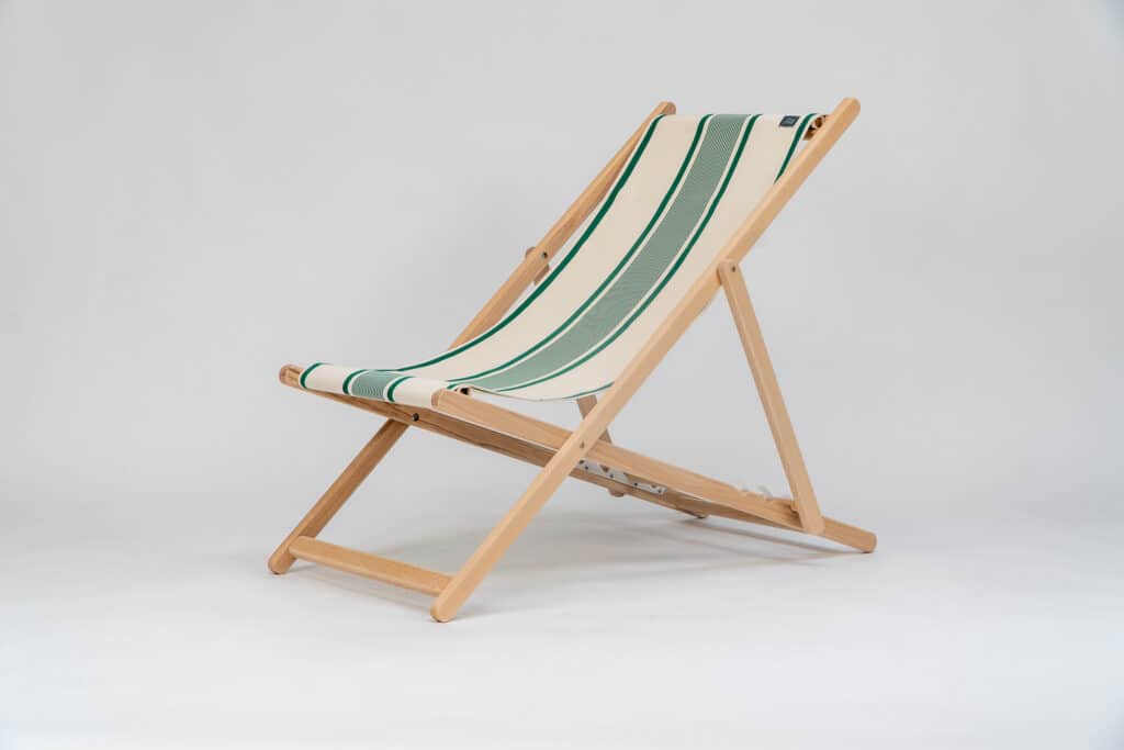 Beechwood Deckchair with Maite Vert fabric, green and cream stripes, viewed from angle - created by Decks and Stipes Ireland