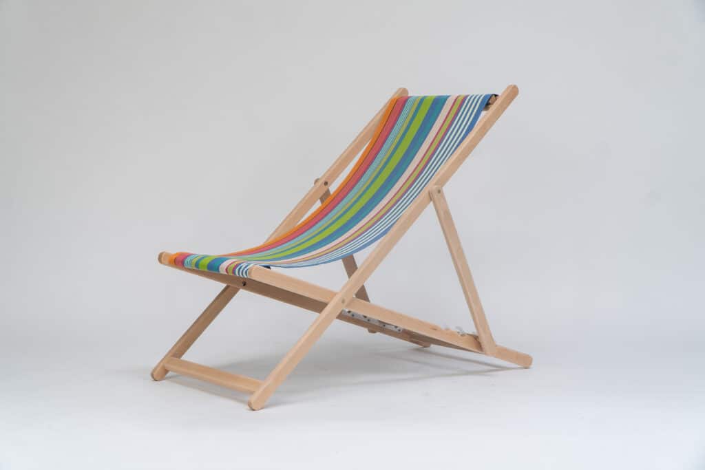 Beechwood Deckchair with Orienteering fabric, green, blue, pink, plum, white and terracotta stripes, viewed from an angle - created by Decks and Stipes Ireland