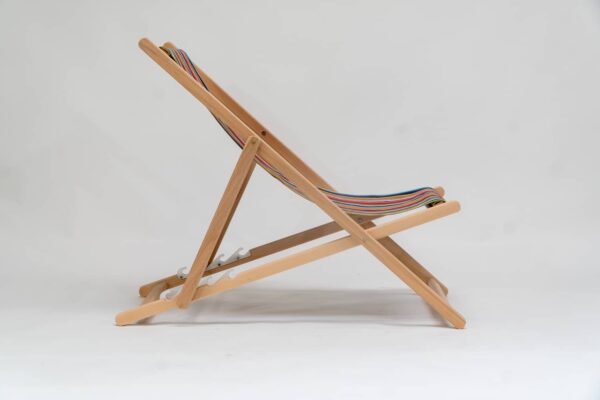 Beechwood Deckchair with Paintballing fabric, blue, green, orange, yellow pink and red stripes, viewed from the side - created by Decks and Stipes Ireland