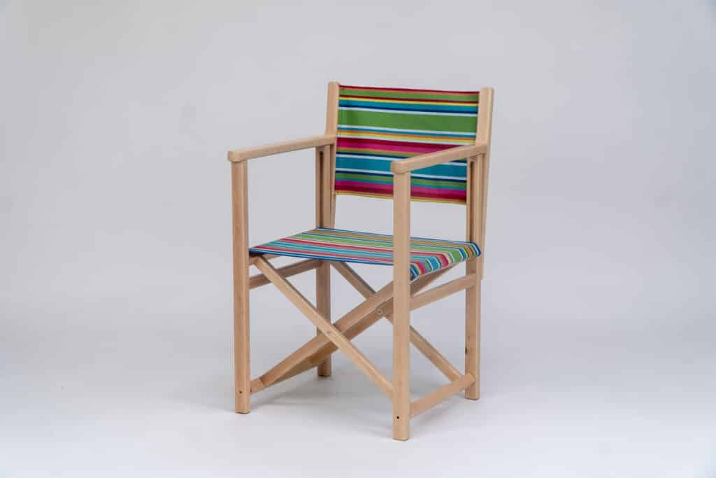 Beechwood Director's Chair with Climbing Fabric - blue, green, yellow, red and pink stripes, viewed at an angle - created by Decks and Stipes Ireland