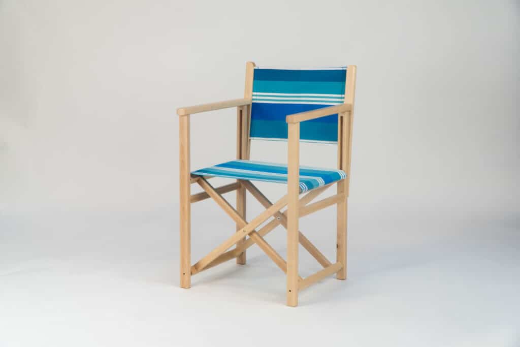 Beechwood Director's Chair with Madrague fabric, turquoise, blue, green and white stripes, viewed from an angle - created by Decks and Stipes Ireland