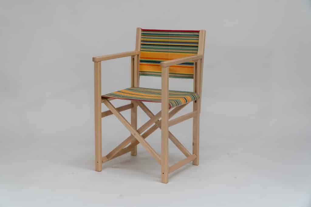 Beechwood Director's Chair with Medley fabric, red, orange, green, black, yellow and blue stripes, viewed from angle - created by Decks and Stipes Ireland (2)