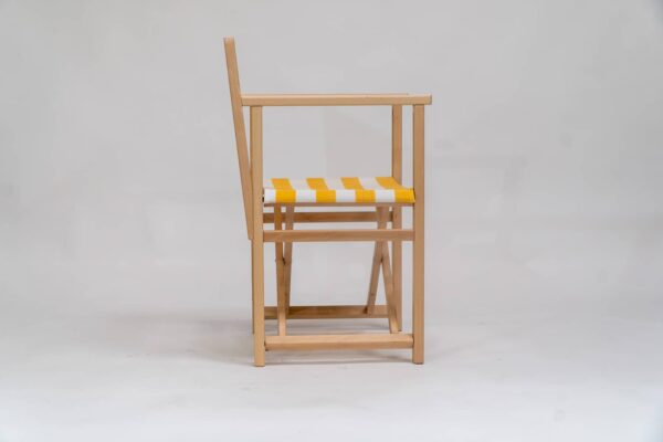 Beechwood Director's Chair with Shot Put fabric, yellow & white stripes, viewed from the side - created by Decks and Stipes Ireland