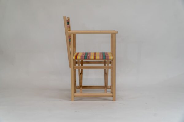 Beechwood Director's Chair with Waltzing fabric, yellow, pink, green, lavendar and white stripes, viewed from the side - created by Decks and Stipes Ireland