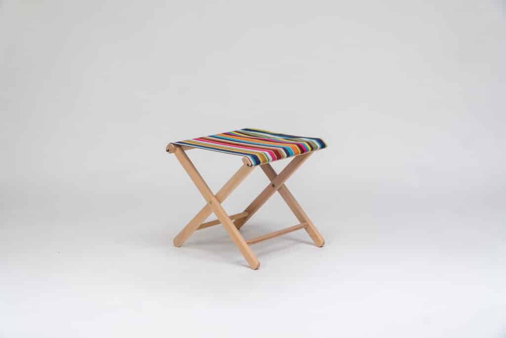 Beechwood Stool with Paintballing fabric, blue, green, orange, yellow pink and red stripes - created by Decks and Stipes Ireland