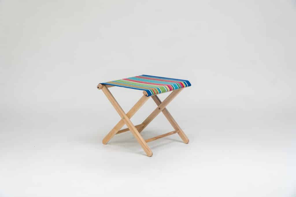 Beechwood stool with Climbing Fabric - blue, green, yellow, red and pink stripes - created by Decks and Stipes Ireland