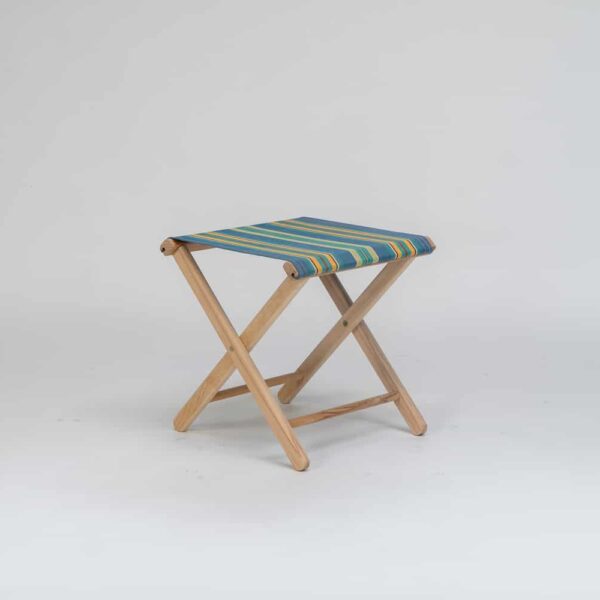 Beechwood stool with Hula Hoop Fabric, blue, green, red and orange stripes viewed from the side - created by Decks and Stipes Ireland