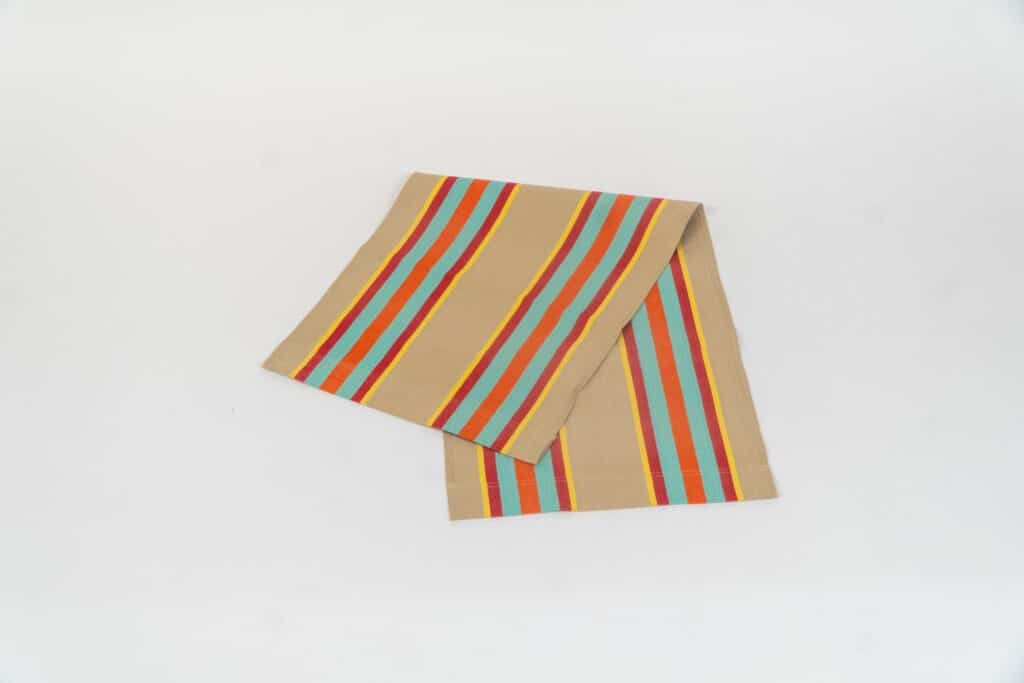 Dice Fabric, fawn, terracotta, turquoise, red, and yellow stripes by Decks and Stripes Ireland