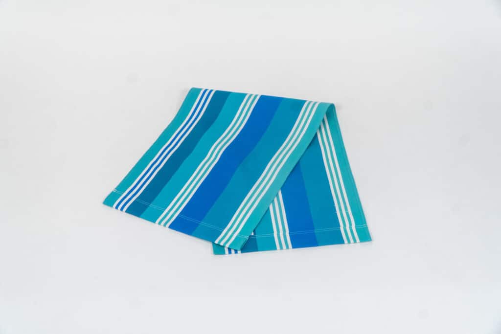 Madrague fabric, turquoise, blue, green and white stripes by Decks and Stripes Ireland